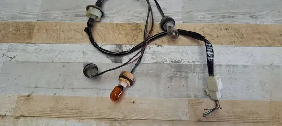 Mazda 5 Tail light bulb cover holder 