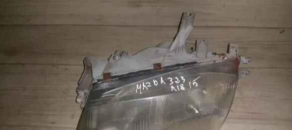 Mazda 323 Headlight/headlamp 08216112l 08-216-112l