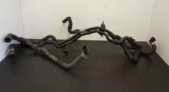 Volkswagen Golf VIII Engine coolant pipe/hose 5WA121065E
