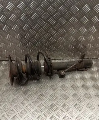 Front shock absorber with coil spring