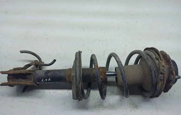 Toyota Avensis T220 Front shock absorber with coil spring