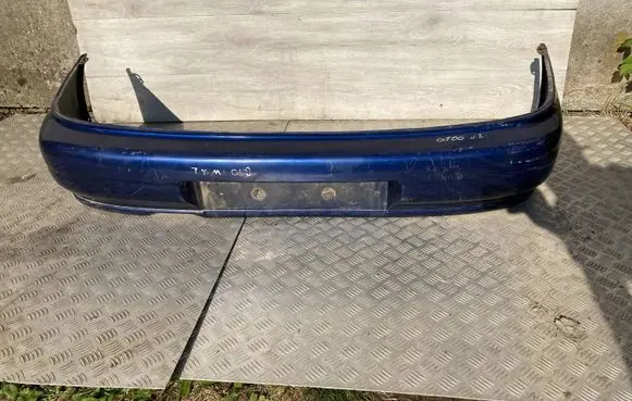 Subaru Impreza I Rear bumper 57720FA040 57720FA050