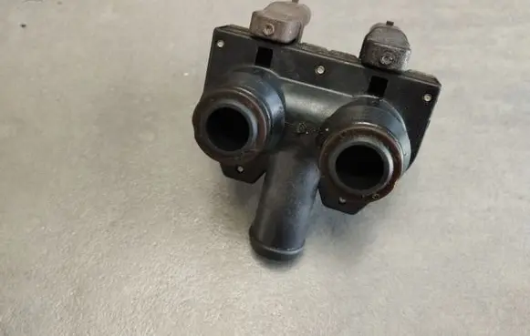 Coolant heater control valve