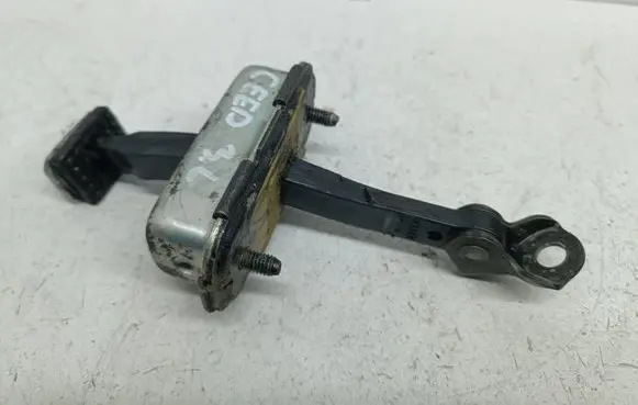 Rear door check strap stopper