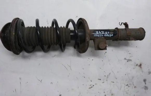 Suzuki Grand Vitara II Front shock absorber with coil spring