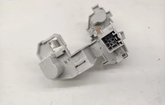 Tail light bulb cover holder