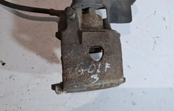 Volkswagen Golf III Front brake caliper