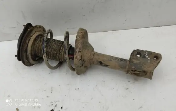 Subaru Legacy Front shock absorber with coil spring