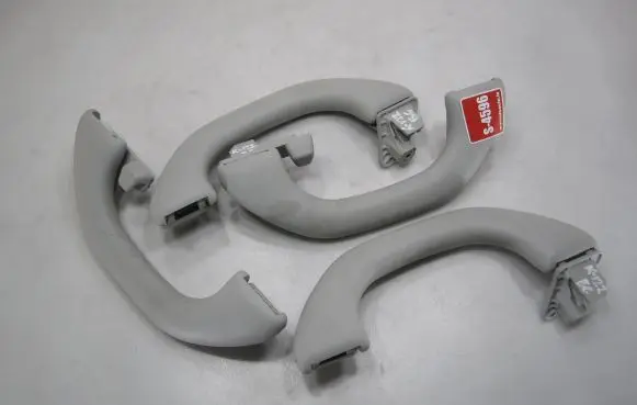 Volkswagen PASSAT B6 A set of handles for the ceiling 1K0857607N