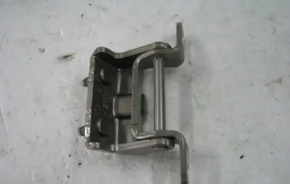 Rear door upper hinge