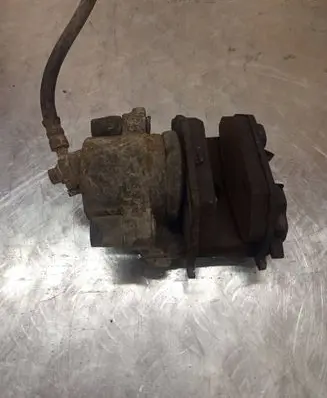 Volkswagen Golf V Front brake caliper 