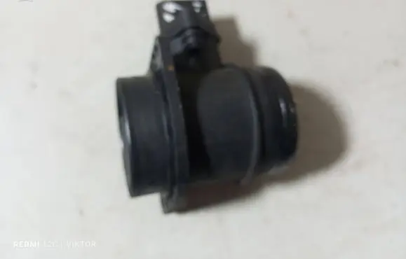 Volkswagen Caddy Mass air flow meter 0281002531 038906461B