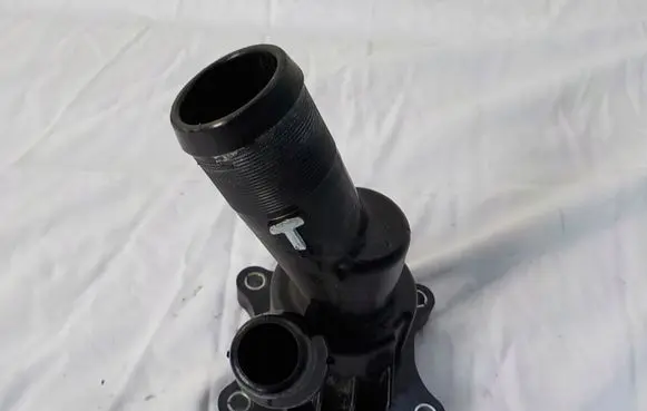 Thermostat/thermostat housing