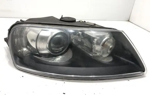 Volkswagen Touareg I Headlight/headlamp 7L6941016AM