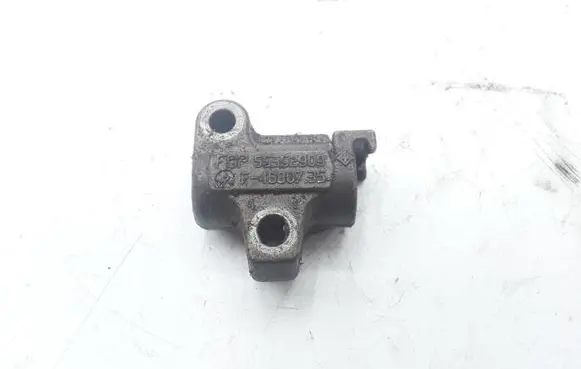 Opel Corsa C Timing belt/chain tensioner 55352909 F4680735