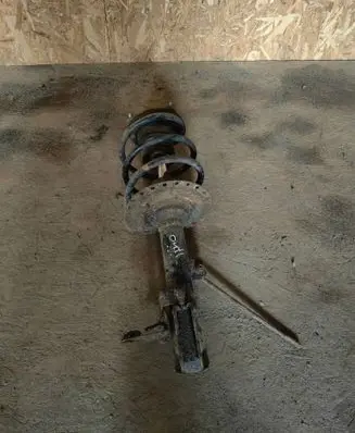 Mitsubishi Outlander Front shock absorber with coil spring
