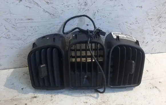 Chrysler Voyager Dash center air vent grill P12221076A