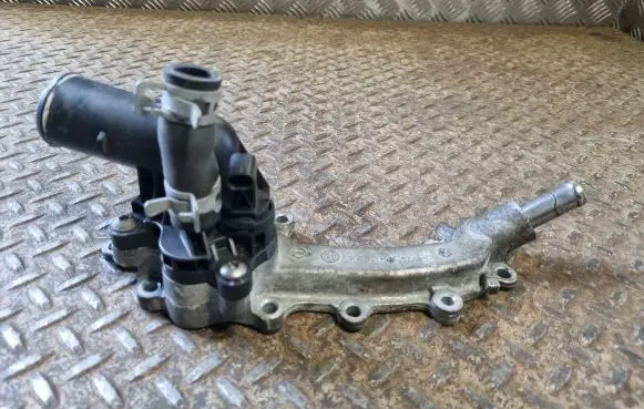 Thermostat/thermostat housing