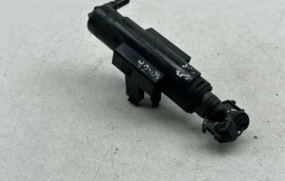 Headlight washer spray nozzle