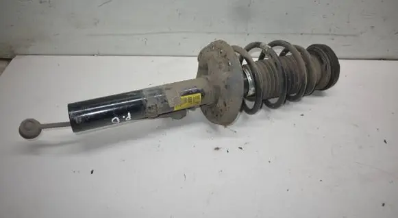 Opel Astra J Front shock absorber with coil spring 13390295