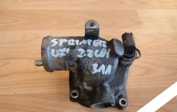 Thermostat/thermostat housing