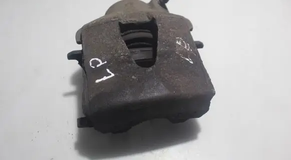 Volkswagen Golf VI Front brake caliper