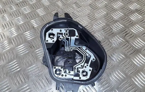 Tail light bulb cover holder