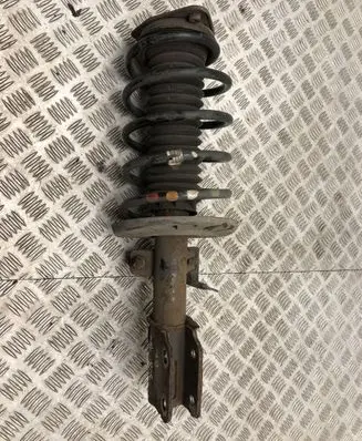 Front shock absorber with coil spring