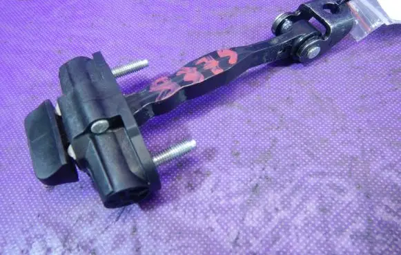 Ford Focus Front door check strap stopper