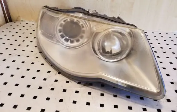 Volkswagen Touareg I Headlight/headlamp 7L6941032A