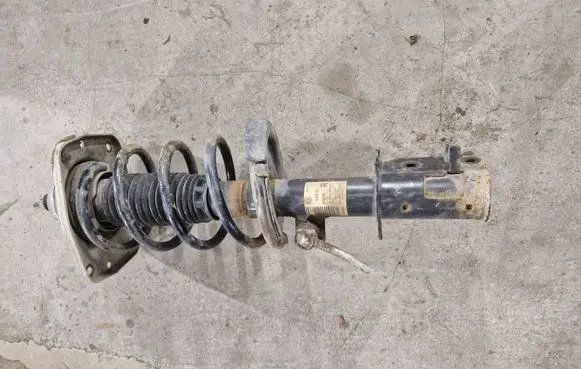 Front shock absorber with coil spring