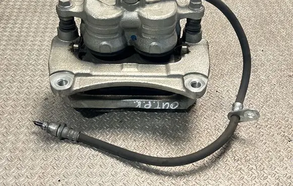 Subaru Outback (BT) Front brake caliper 26292AN01A 0F00B