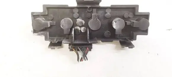 Tail light bulb cover holder