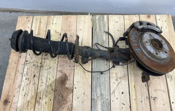 Suzuki Swift II Front shock absorber with coil spring 4160170L00