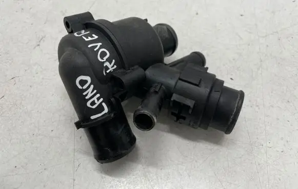 Thermostat/thermostat housing