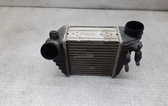 Volkswagen Golf IV Intercooler radiator 1J0145803F