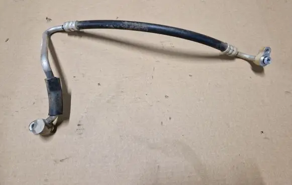Mitsubishi L200 Air conditioning (A/C) pipe/hose MN123619