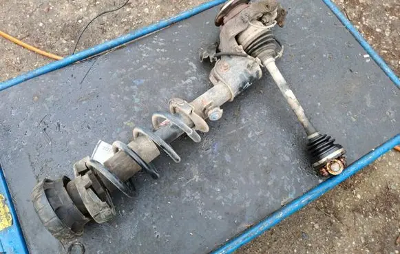 Opel Vivaro Front shock absorber with coil spring