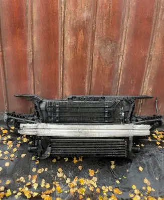 Radiator support slam panel