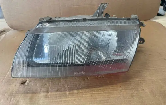 Mazda 323 Headlight/headlamp 1305235336 MAZDA323P