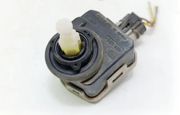 Opel Astra G Headlight level adjustment motor 90590665