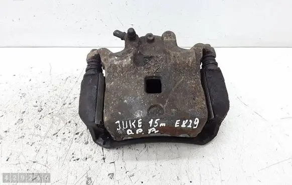Nissan Juke I F15 Front brake caliper