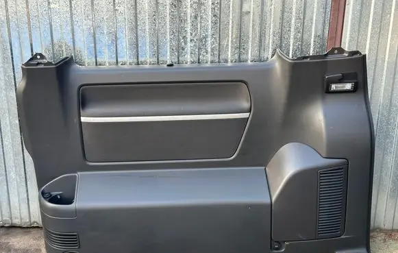 Volkswagen Multivan T5 Trunk/boot side trim panel 7H5868716