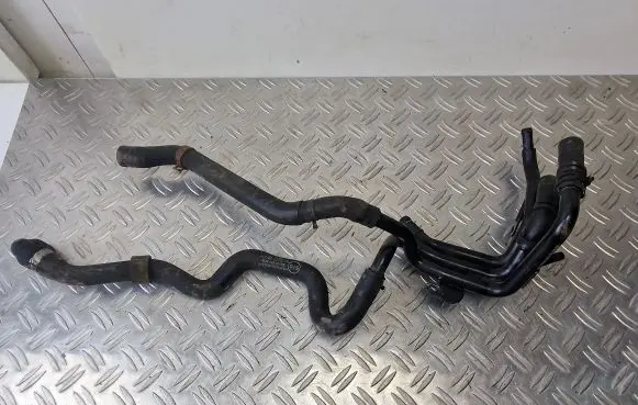 Volkswagen Golf VII Engine coolant pipe/hose 5Q0122101BE