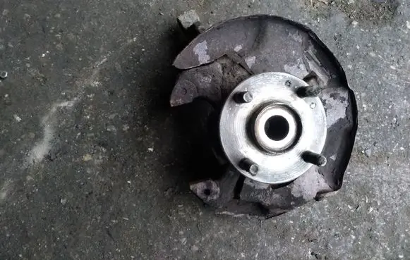 Mazda 323 F Front wheel hub spindle knuckle