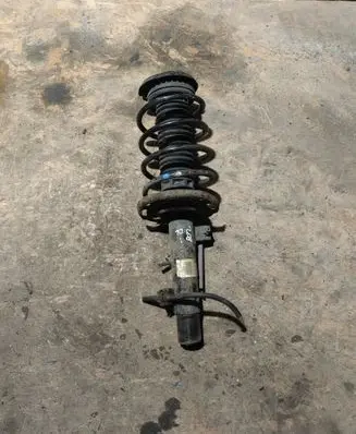 Peugeot 208 I Front shock absorber with coil spring 