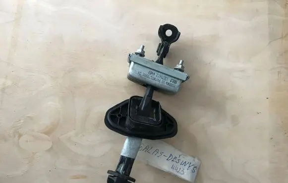 Rear door check strap stopper