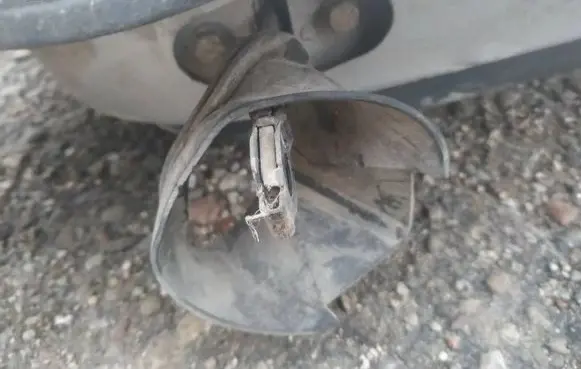 Rear door check strap stopper