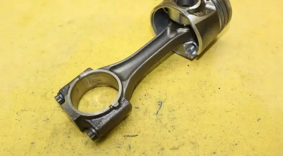 Piston with connecting rod