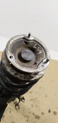 Front shock absorber with coil spring